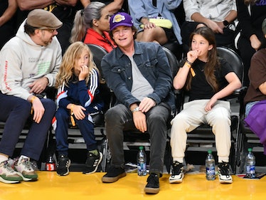 Jason Sudeikis (left) and Jason Bateman (second right) at a Lakers game with their kids with dueling...