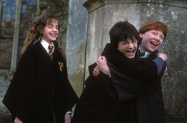 Harry Potter kids laughing, no doubt at one of these Harry Potter jokes. 